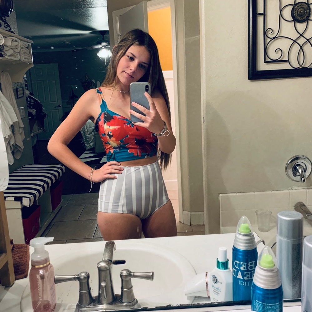 Kortni Jean grey and white striped bottoms.